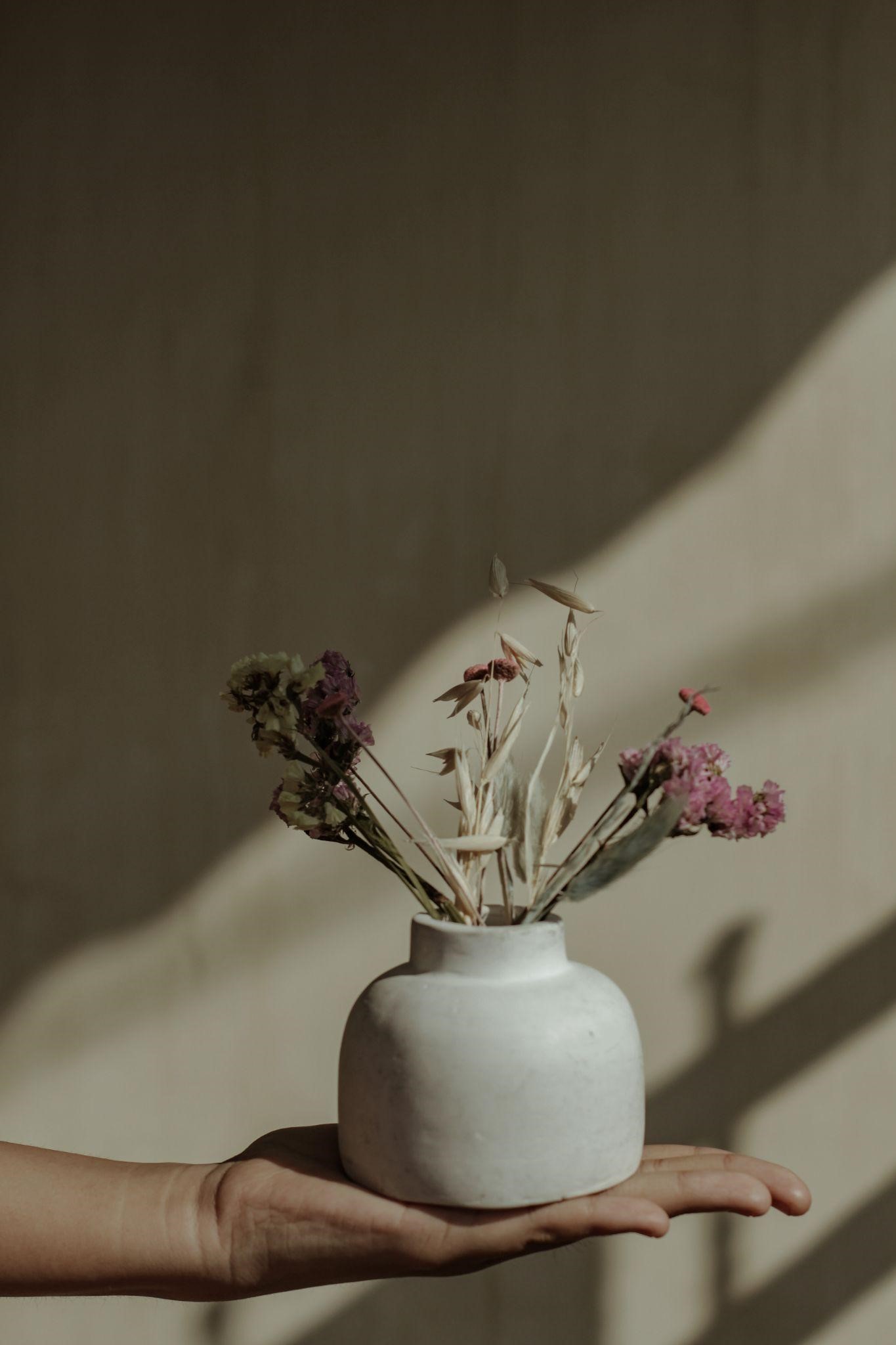 Pollen-free artificial flowers in a beautiful vase.