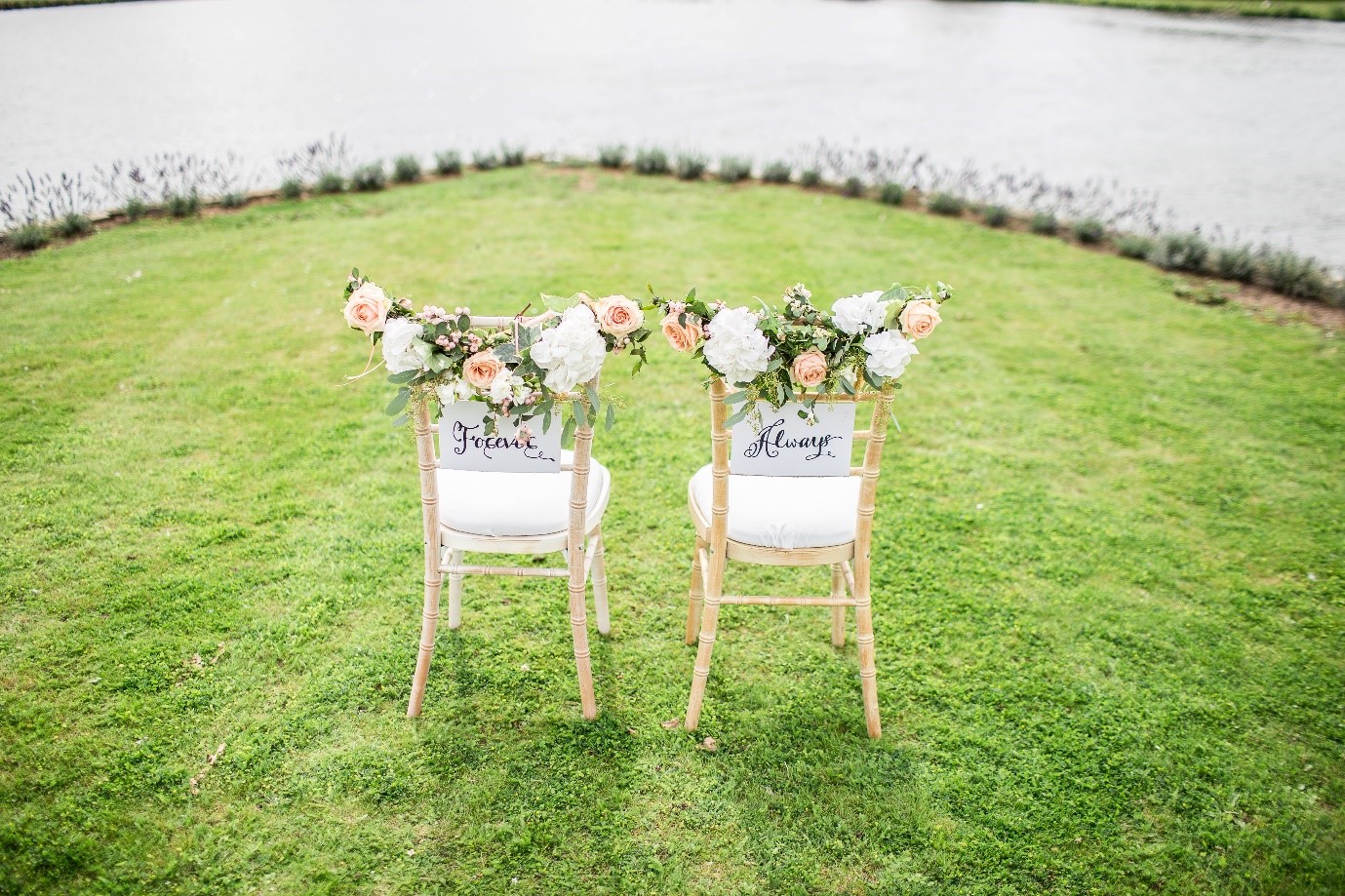 Artificial flower photo booth lined with flowers